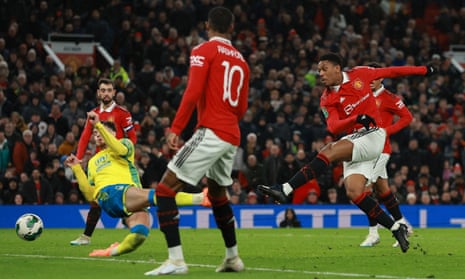 Manchester United's Anthony Martial slams the ball home to open the scoring.