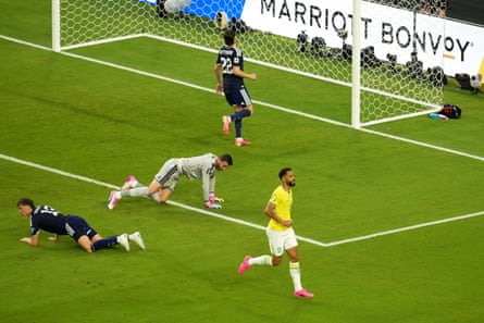 Brazil’s Matheus Cunha (right) celebrates aft scoring Brazil’s third