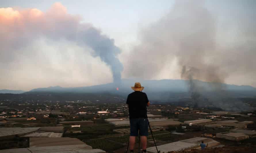 A man surveys the scene in the aftermath of the eruption on La Palma