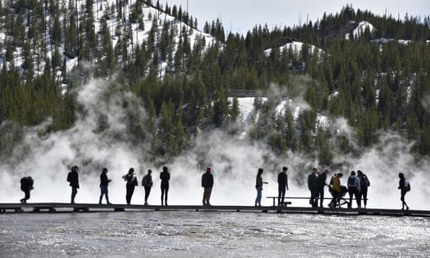 Visitors at Grand Prismatic spring in Yellowstone, Wyoming, on 1 May 2021.