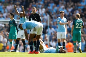 Manchester City’s Leroy Sane, Fernandinho and team mates celebrate after the referee blows the final whistle.