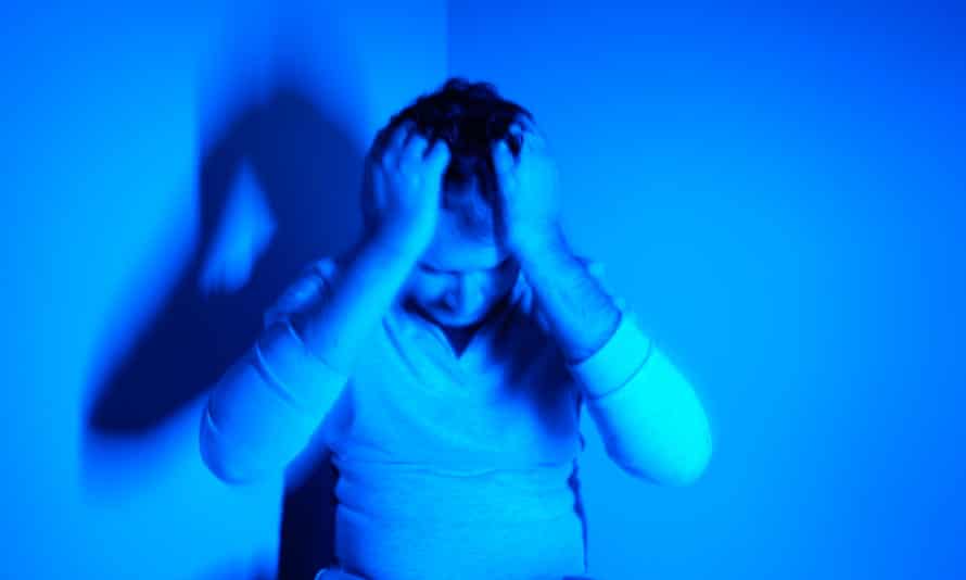 Man with head in his hands