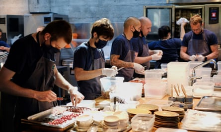 Workers in the kitchen at Noma in 2021.