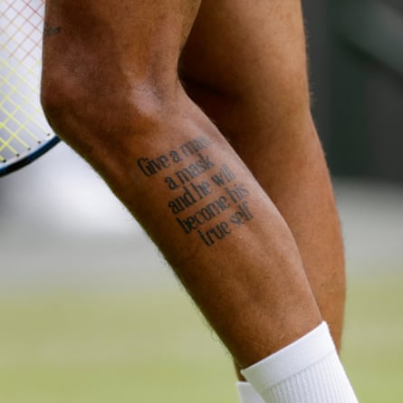 Tom Jenkins’ best shots of Wimbledon 2022 – in pictures | Wimbledon 2022 23 Nick Kyrgios’ leg tattoo of the Oscar Wilde quote “Give a man a mask and he will become his true self” .