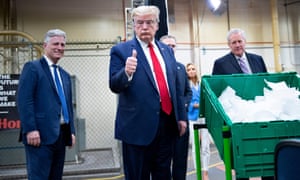 Trump at a Honeywell factory in Phoenix in May. The economic argument for November’s election has become deeply entwined with public health policy.