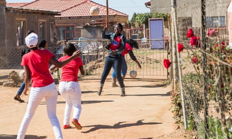Rise Club members play football after a group meeting. Temba, South Africa