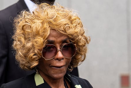 a woman walks outside court