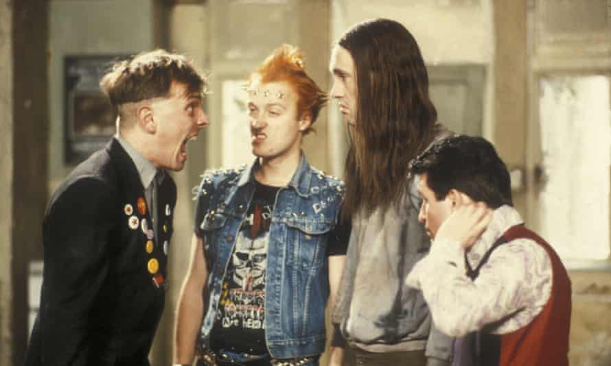 Rik Mayall, Adrian Edmondson, Nigel Planer, and Christopher Ryan in the Young Ones