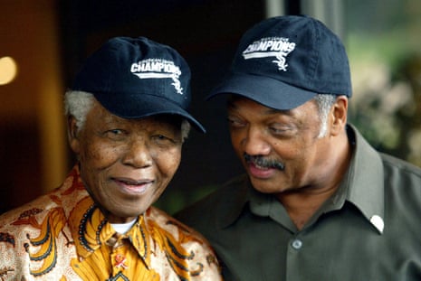 Former South African President Nelson Mandela and Jesse Jackson at a news conference in Johannesburg in October 2005.