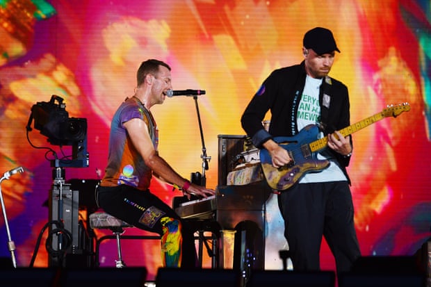 Coldplay's Chris Martin and Jonny Buckland at Wembley Stadium.