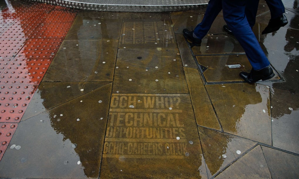 A recruitment ad for the British intelligence service GCHQ on the pavement in Shoreditch, east London.