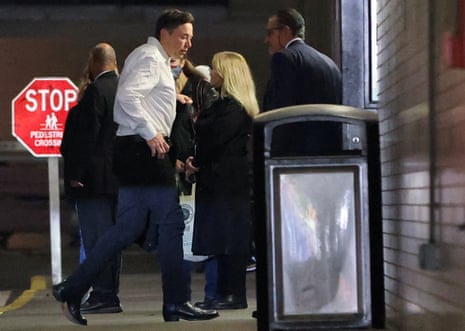 Elon Musk arrives at the Baron investment conference in Manhattan, jogging into the building via a side door.