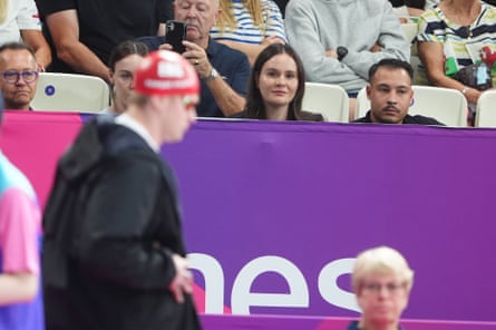 Holly Ramsay-Peaty watches on as her husband, Adam, prepares for his 50m breaststroke heat.