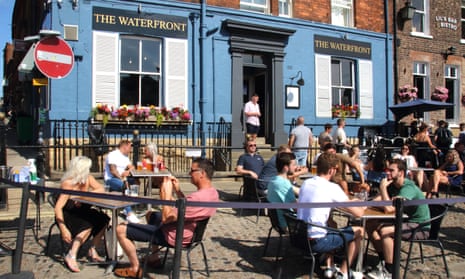 People eat outside at a restaurant in Yorkshire as part of the Treasury’s ‘eat out to help out’ scheme in August