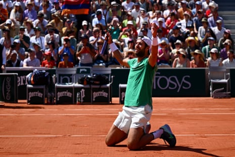 Khachanov celebrates winning match point against Kokkinakis.