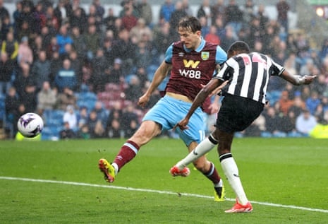 Newcastle United's Alexander Isak scores his side's fourth goal at Burnley.