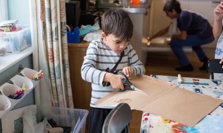 Zephan, four, makes a cardboard model