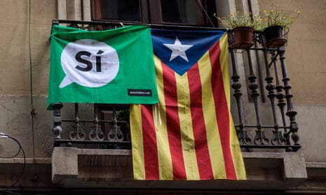 Catalan independence flags hang from a balcony in Barcelona.