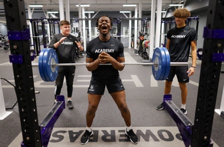Benson Jerry, a defensive lineman from Nigeria, lifting with teammates Liam Dineen (left) and Rafael Varona-Blakstad during a weights session for the NFL Academy in the Powerbase Gym at Loughborough University.