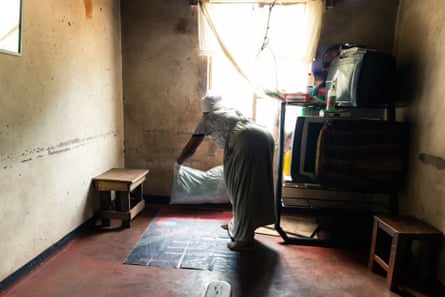An untrained midwife, whose house has served as a makeshift maternity ward