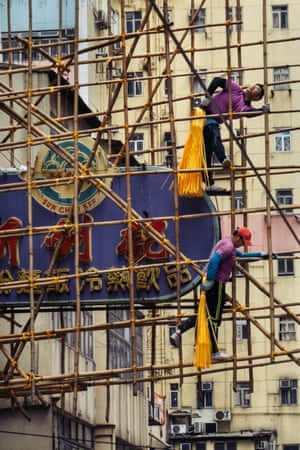 Workers on bamboo scaffolding in North Point, Hong Kong.“I was desperate to capture Hong Kong anew: its lights, its colours, its contours. On my days off I would ride trams and ferries for hours on end, obsessing about possible scenes I had in mind. And yet the more I photographed, the more I worried about what might still go unseen before the city changed irrevocably — or I had to leave.