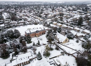 Surrey, UKA view over the village of Fetcham after a snowfall, showing the Grade II-listed Fetcham Park House alongside St Mary’s church