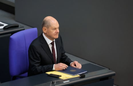 German Chancellor Olaf Scholz attends a session at the Bundestag (lower house of parliament) in Berlin before the upcoming EU summit.