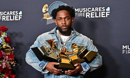 Kendrick Lamar with his Grammys haul, including record of the year for Not Like Us