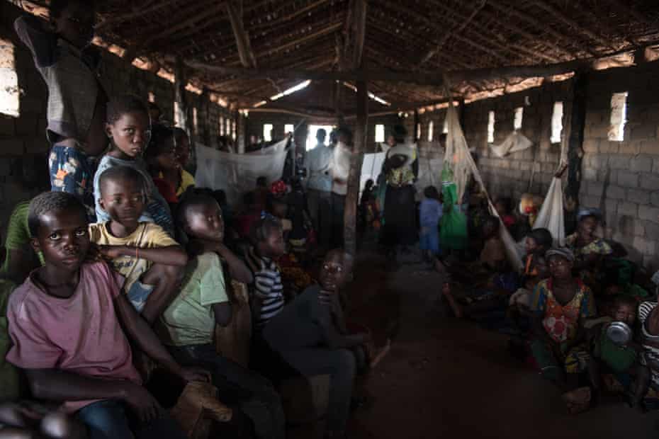 Displaced families shelter inside a church in Tanganyika province