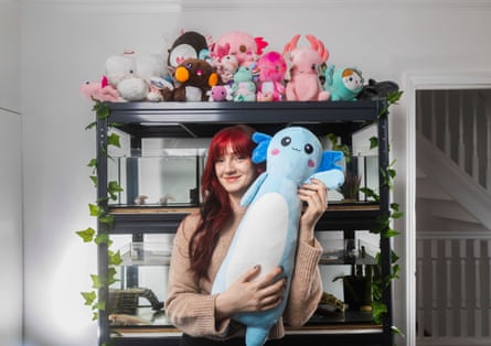 Nicole Rowe with just a few of her cuddly axolotls.