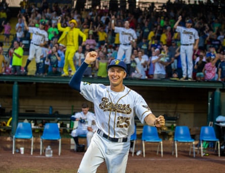 The Savannah Bananas play Banana Ball against the Catawba Valley Stars at Grayson Stadium. Banana pitcher Christian Dearman leads dancing to Stand By Me between innings.