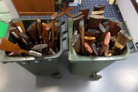 Guns in two wheelie bins handed in to the Tasmanian police during a gun buyback campaign in 2017.