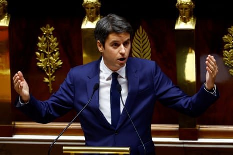Former French prime minister Gabriel Attal, member of parliament gestures as he delivers a speech during a debate on two motions of no-confidence against the French government