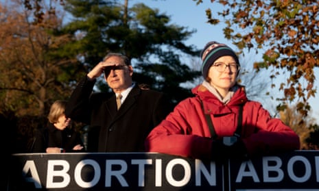 The Arkansas senator John Boozman joins anti-abortion protesters outside the supreme court in Washington in December 2021.