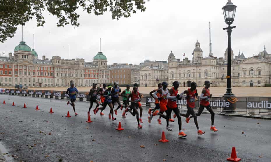 A group of elite male competitors races past Horse Guards Parade in the London Marathon on Sunday.