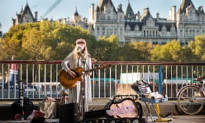 Busker Charlotte Campbell on the South Bank, London.