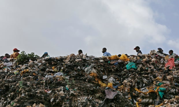 Plastic bags stick out of a pile of rubbish in the Kibera slum in Nairobi, Kenya.