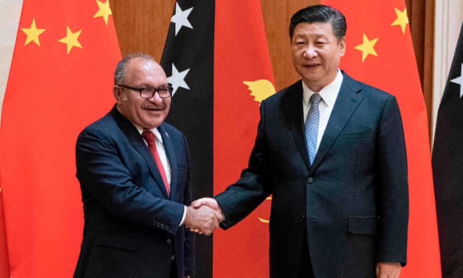 Papua New Guinea’s prime minister Peter O’Neill shakes hands with China’s President Xi Jinping in Beijing in 2018