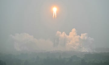 A Long March 5 rocket carrying the Chang'e-6 mission lunar probe lifts off from the Wenchang Space Launch Centre in Hainan Province.