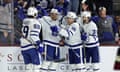 The Toronto Maple Leafs’ Auston Matthews, second from left, celebrates with teammates after scoring his 50th goal of the season on Wednesday against the Arizona Coyotes at Mullett Arena in Tempe, Arizona.