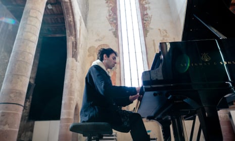 Alexandre Kantorow plays in the church of the Dominicains of Haute-Alsace, France, earlier this year.