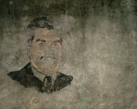 A damaged mural of Nicolás Maduro