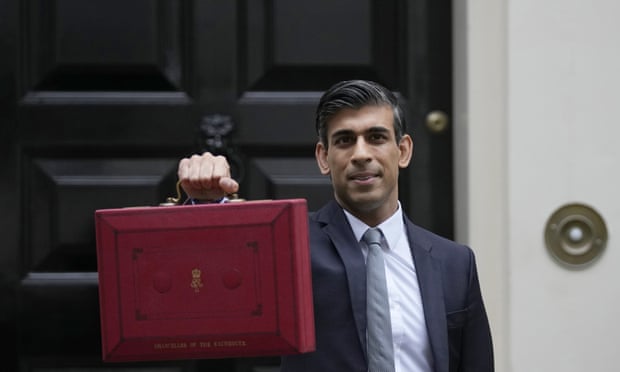 Rishi Sunak holds up the traditional ministerial red dispatch box as he leaves for the House of Commons to deliver the budget, October 2021.