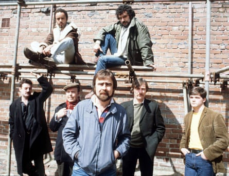 Michael Angelis, seated top right, with the writer Alan Bleasdale, front, and fellow actors in the hard-hitting TV series Boys from the Blackstuff, 1982.