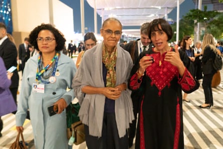 Colombia minister of environment and sustainable development and head of Cop16 Susana Muhamad, right, chats with Brazil environment minister Marina Silva, centre, during Cop28 in Dubai last December.