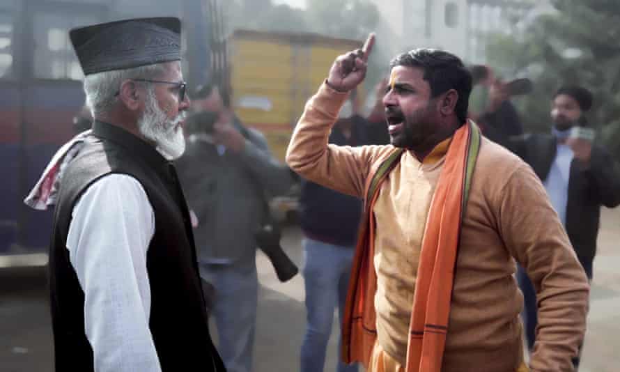 Hindu gesturing to a Muslim