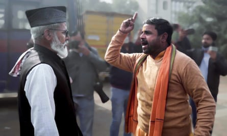 Hindu gesticulating at a Muslim man