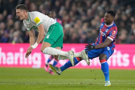 Marc Guehi fouls Sven Botman with a hefty challenge.