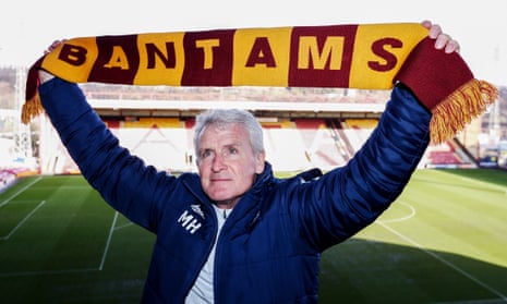 New Bradford City manager Mark Hughes poses for a photograph after being unveiled.