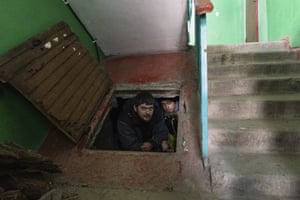 People shelter from shelling in the basement, Mariupol, Ukraine